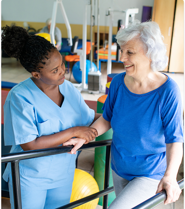 Elderly woman in physical therapy session