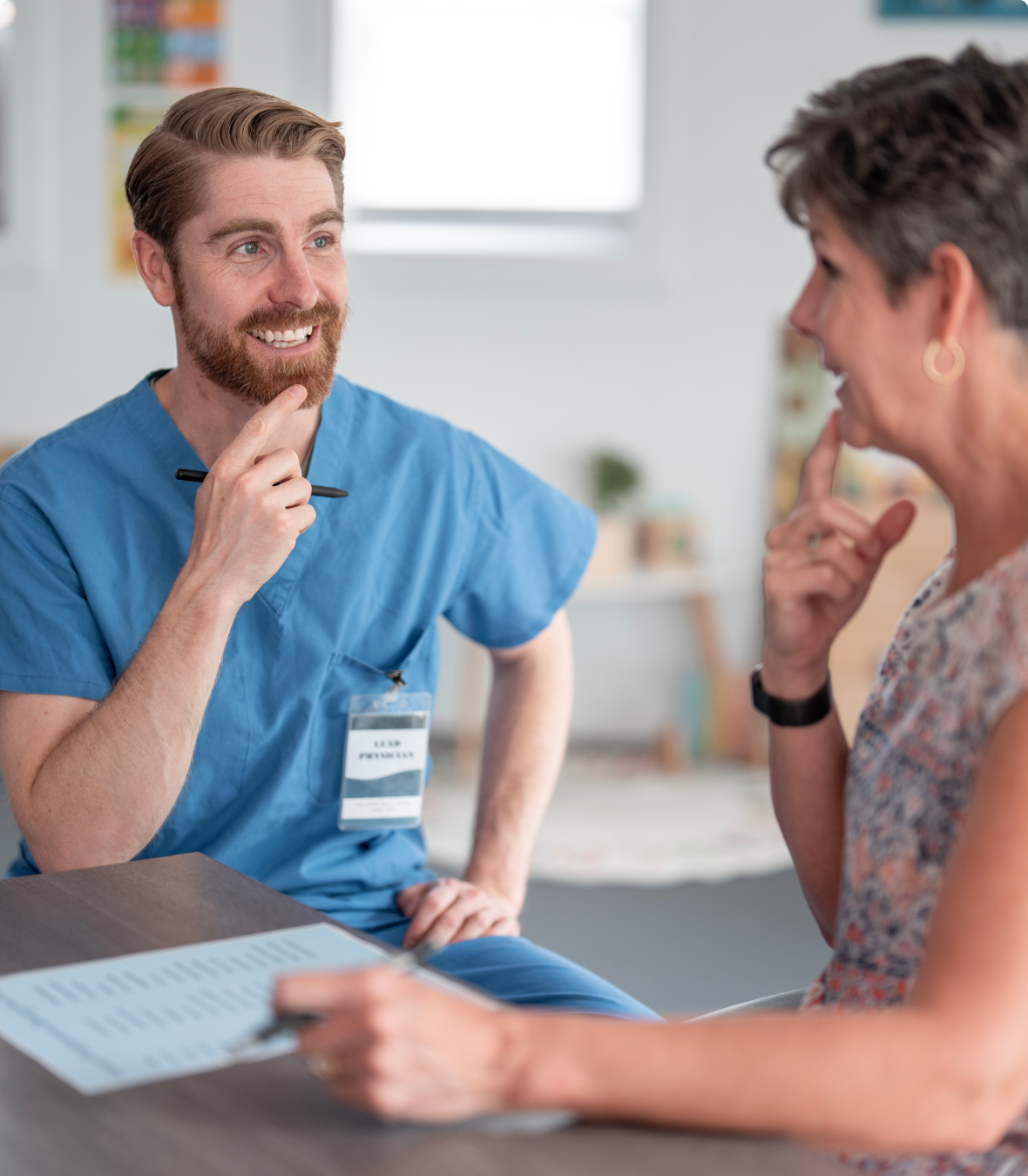 A healthcare professional and patient discussing treatment options.