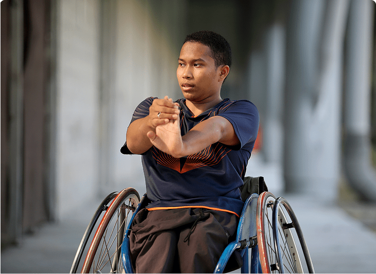 Disabled athlete performing stretches